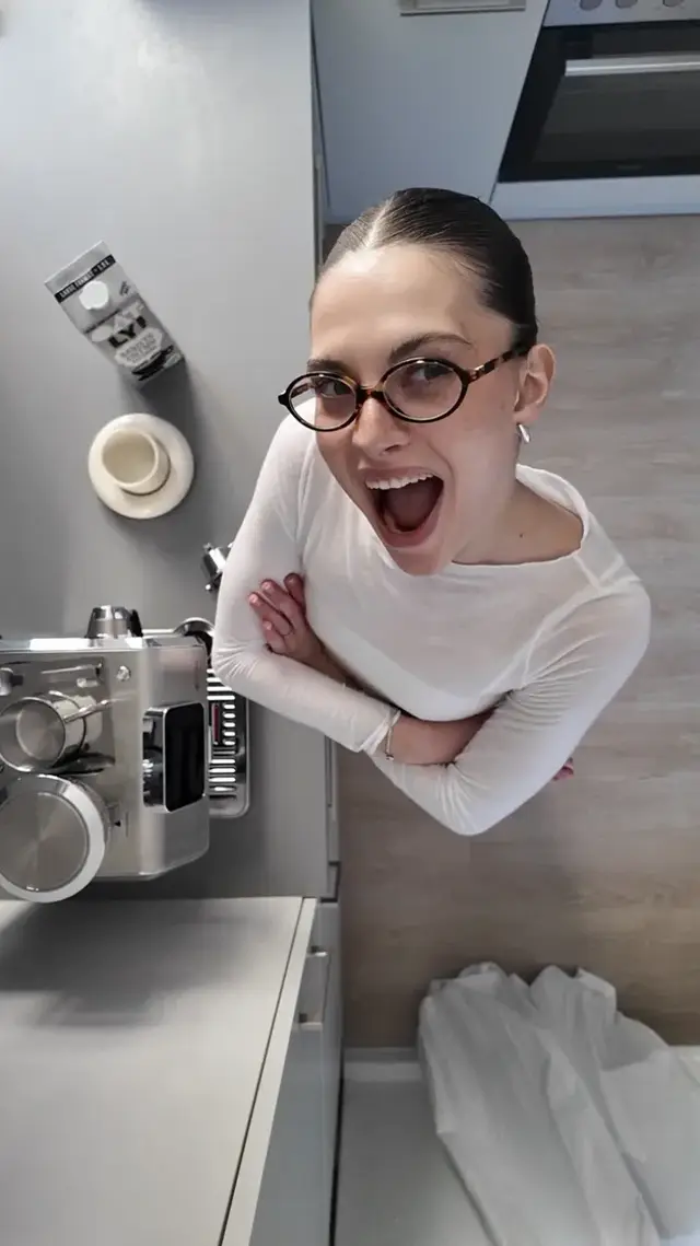 De'Longhi La Specialista Touch — creator in a kitchen with the espresso machine